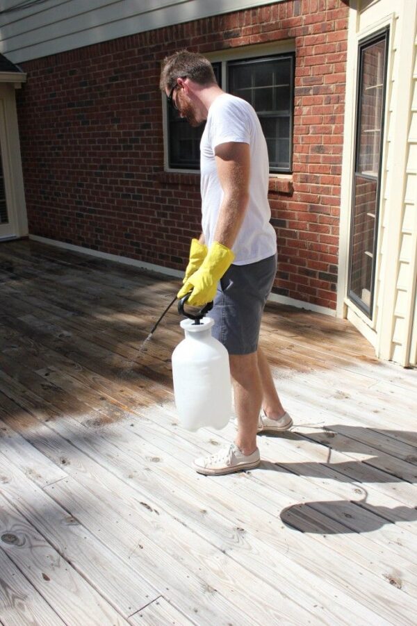 applying Fire Retardant Spray For Exterior Wood to an attached wood deck